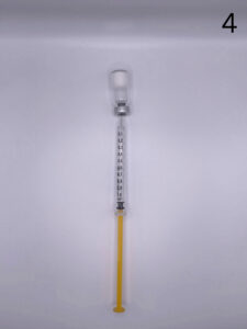 Mixing Instructions 4 depressing water into vial